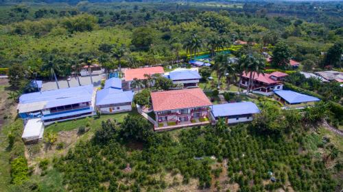 an aerial view of a village with houses at Finca Hotel la Manuela in Armenia