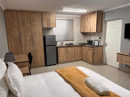 Dapur atau dapur kecil di Mashobs Guest House