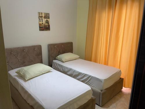 Postel nebo postele na pokoji v ubytování Niko