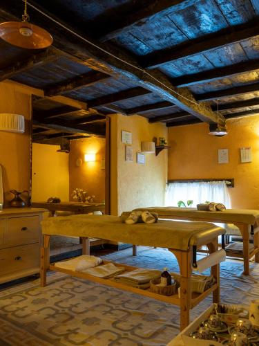 a kitchen with a large wooden table in a room at Al Castello Resort in Sillavengo