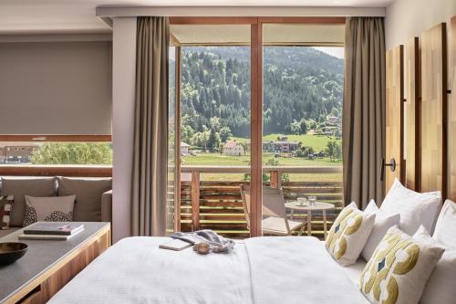Posteľ alebo postele v izbe v ubytovaní Falkensteiner Hotel & Spa Carinzia Superior