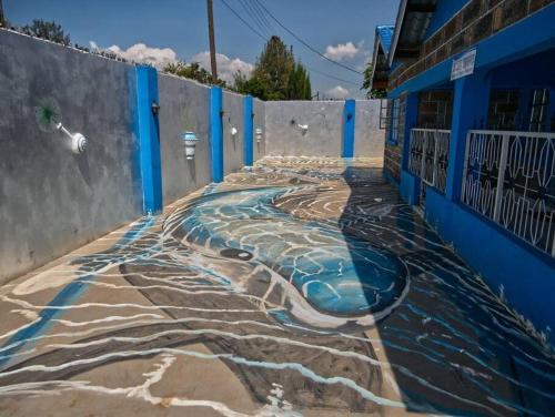 Swimmingpoolen hos eller tæt på The Blue Wave