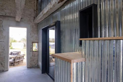 Photo de la galerie de l'établissement Gîte de la bergerie, le Loft, à Lancieux