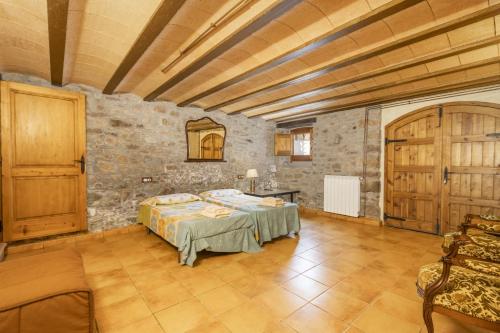 Ένα ή περισσότερα κρεβάτια σε δωμάτιο στο Casa Marcús