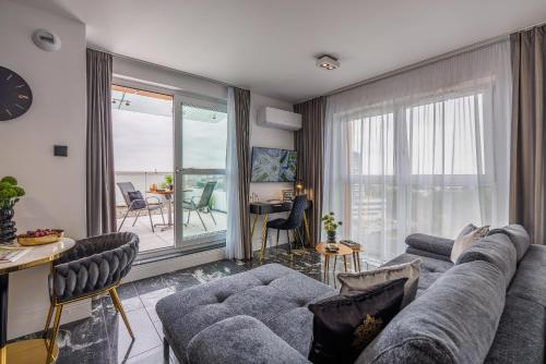 Posezení v ubytování Emihouse Riverside Apartments