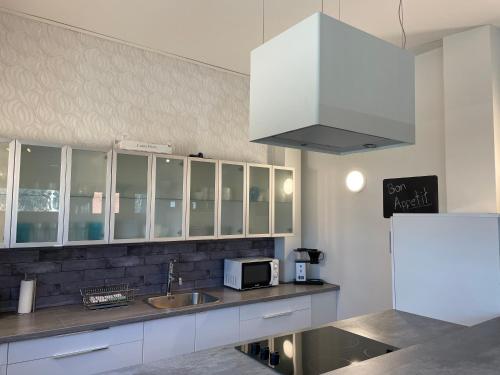 Η κουζίνα ή μικρή κουζίνα στο Hungerborg City Home