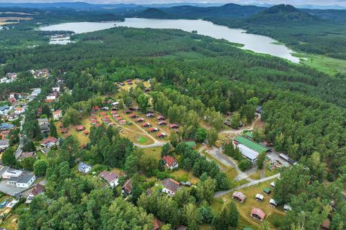 an aerial view of a park next to a lake at Chatová osada Bílý Kámen in Doksy