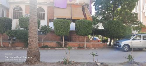 a car parked in front of a house at Villa El kheer in `Ezbet el-Dabdûba