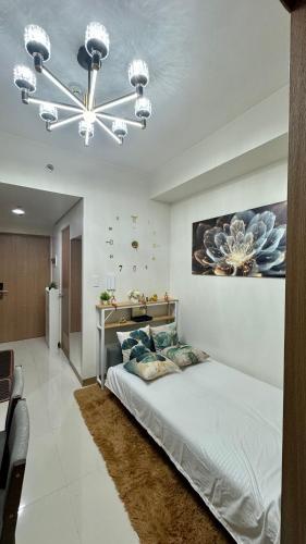 Postel nebo postele na pokoji v ubytování GoodVibes Condotel