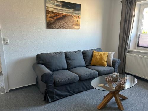 Ruang duduk di Wohnung "Strandturm" in Wremen am Deich
