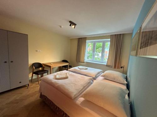 Cybulskiego Guest Roomsにあるベッド