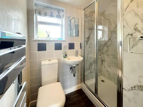 Et badeværelse på Wren Cottage North Norfolk