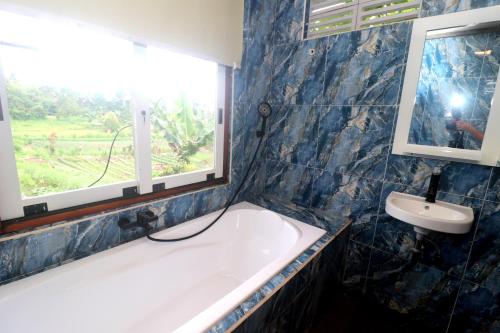 Ένα μπάνιο στο Villa Lokon Tomohon