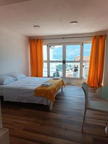 Postel nebo postele na pokoji v ubytování Apartmani Ribar
