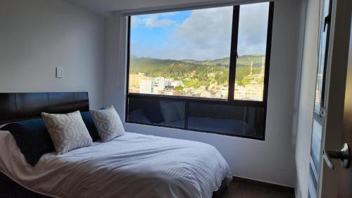 Postel nebo postele na pokoji v ubytování Apartamento Nuevo Central Piso 7 Terraza privada