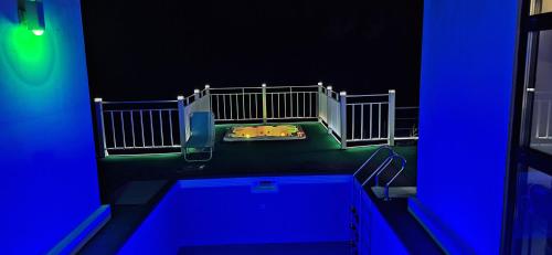a view of a room with a bed and a pool at Yangpyeong Sunset Pool Villa Pension in Yangpyeong