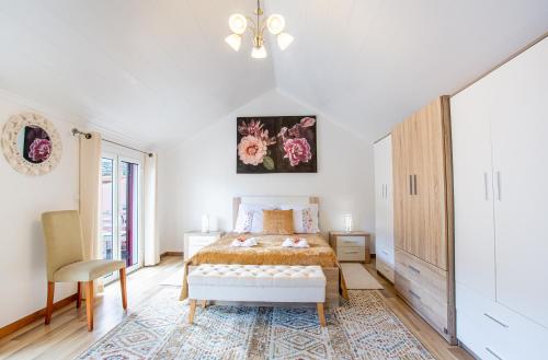 En eller flere senge i et værelse på Casa da Avó