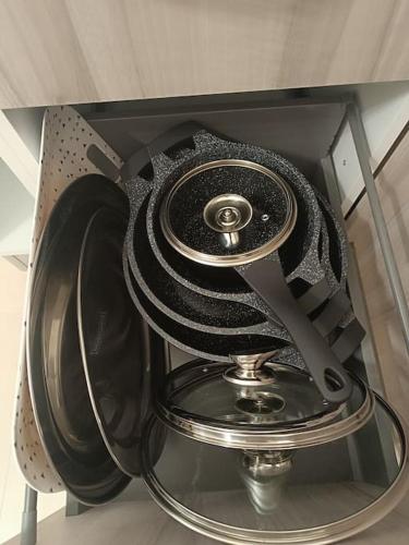 a glass shelf with a dishwasherigunigunigunigunigun at vacanza in Salento, La Terrazza in Surano