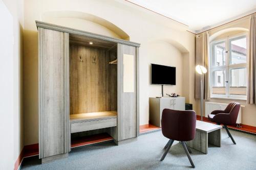 TV a/nebo společenská místnost v ubytování Luckau Appartements 1695