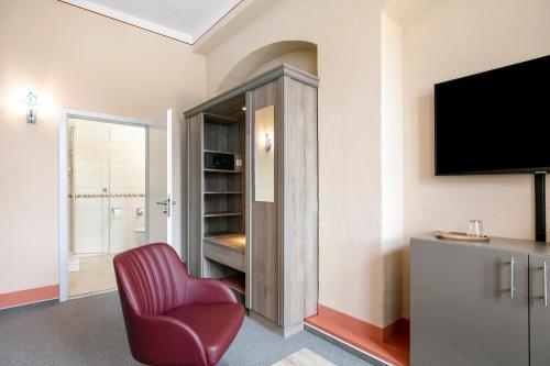 TV a/nebo společenská místnost v ubytování Luckau Appartements 1695