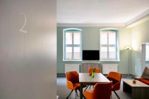 TV a/nebo společenská místnost v ubytování Luckau Appartements 1695