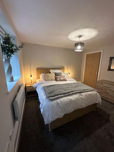 Postel nebo postele na pokoji v ubytování Cosy Flat in Central Hexham