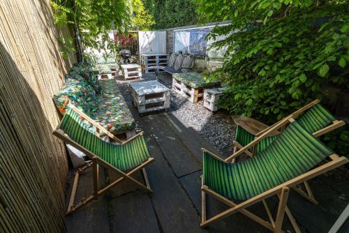 an overhead view of two green chairs on a patio at SAFARI HOUSE - Wisła in Wisła
