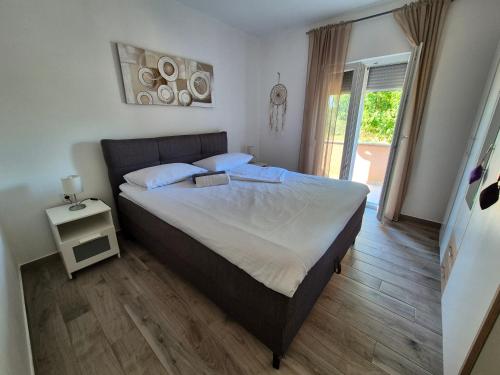 Ένα ή περισσότερα κρεβάτια σε δωμάτιο στο Holiday Home Begonja