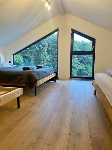 Postel nebo postele na pokoji v ubytování Tiny house & AC
