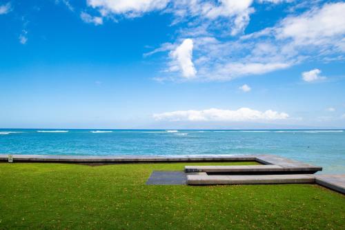 a park with a view of the ocean at Amazing Sunsets Oceanfront Views - indigomaui - in Kahana