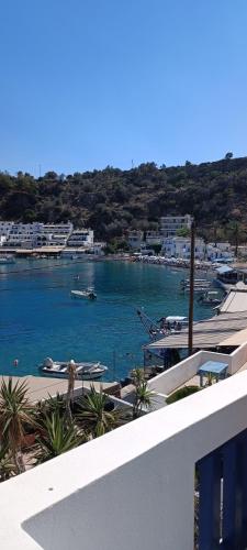 a view of a harbor with boats in the water at Keramos in Loutro
