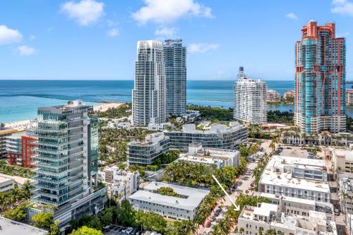 an aerial view of a city with tall buildings and the ocean at Gorgeous coastal PH with Large Private Terrace in Miami Beach