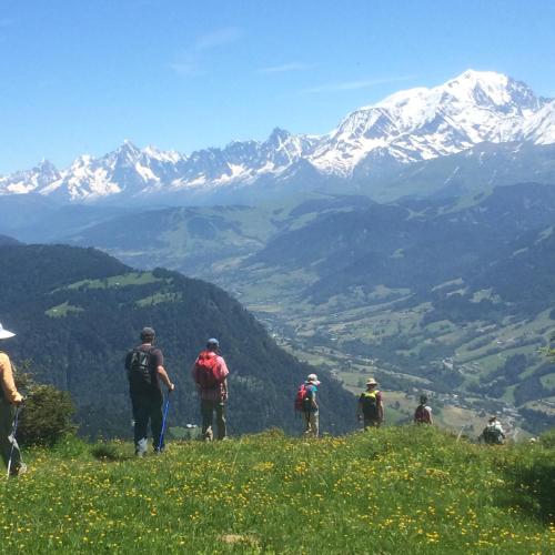 a group of people standing on top of a mountain at Hôtel Flor'Alpes in La Giettaz