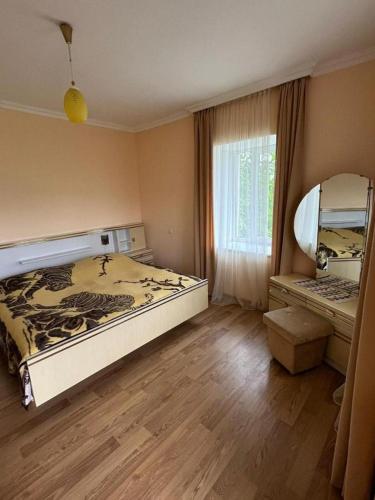 Postel nebo postele na pokoji v ubytování Guesthouse in Lankhvri