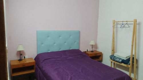 En eller flere senge i et værelse på Grevillea