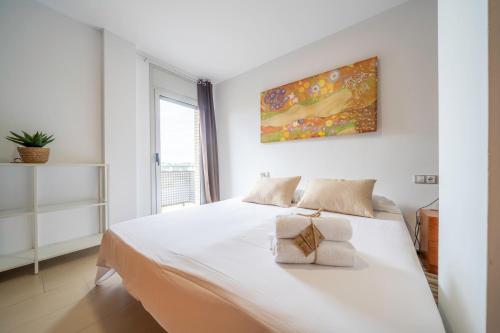 Posteľ alebo postele v izbe v ubytovaní HomeHolidaysRentals Blanescel - Costa Brava