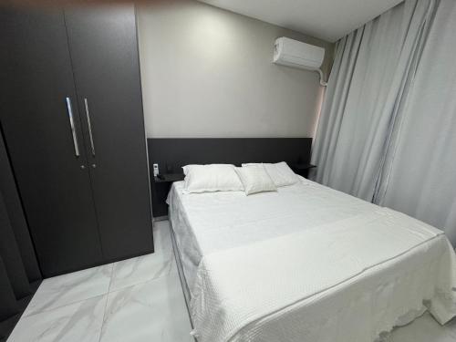 Ένα ή περισσότερα κρεβάτια σε δωμάτιο στο Design Loft - Near Copacabana Palace Hotel and Copacabana Beach