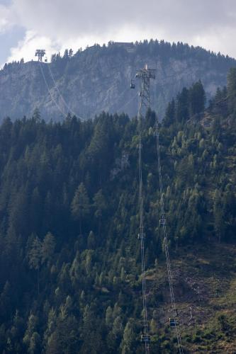 a gondola lift in the middle of a mountain at Appartements zum Strossna in Mayrhofen
