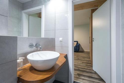 Ванная комната в VacationClub - Podgórzyńska 6A apartament 6
