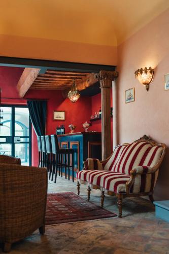 a living room with a couch and a table at Villa Liverzano in Brisighella
