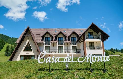 a house on a hill with the words casita del autore at Casa del Monte - Dorna Arini in Dorna Arini