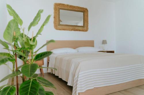 En eller flere senge i et værelse på Casa Aguita, Atico Villaverde