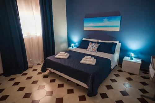Postel nebo postele na pokoji v ubytování Vossia Casa Vacanze