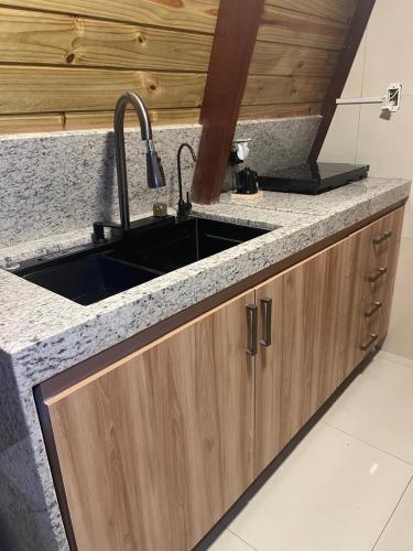 Dapur atau dapur kecil di Pérola Cabana