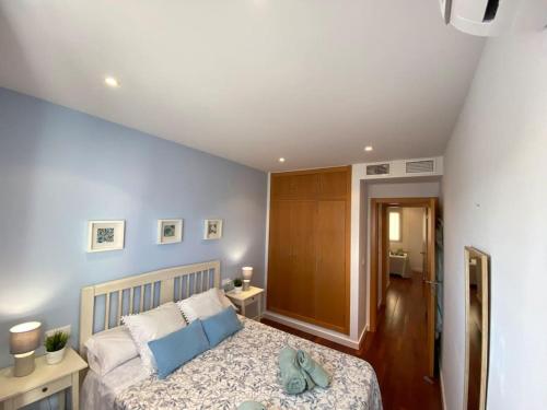 Ένα ή περισσότερα κρεβάτια σε δωμάτιο στο Apartamento Mati, Terraza 55 m2