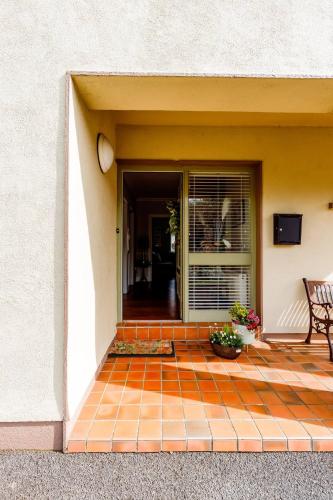 a front door of a house with a patio at Station Road Homestay in Castlebar