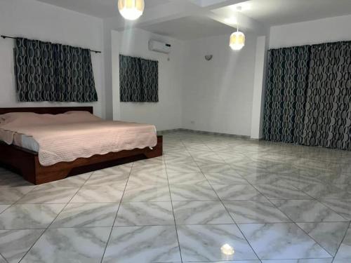 En eller flere senge i et værelse på Bel Blanch