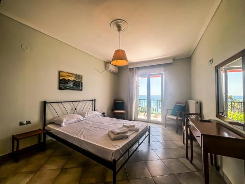 Postel nebo postele na pokoji v ubytování The Horizon Apartment