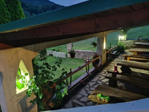 an overhead view of a house with a yard at Rural household Konak Vukovica in Mojkovac