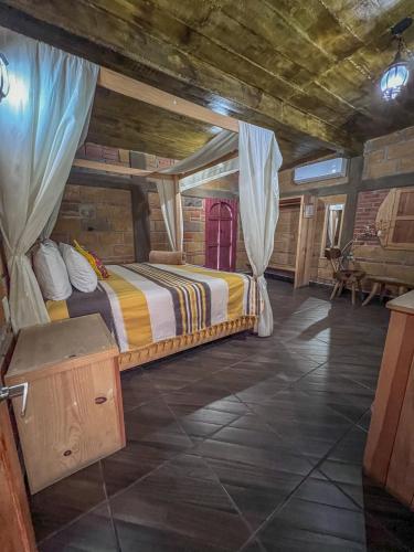 Ein Bett oder Betten in einem Zimmer der Unterkunft Finca las Isabeles